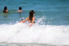 Alessandra_Ambrosio_in_bikini_at_the_beach_in_Florianopolis_07-22-2024__21_.jpg