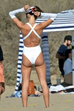 Alessandra-Ambrosio-shows-off-her-fit-body-in-a-white-swimsuit-while-playing-beach-volleyball-...jpg