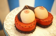 00156035-Erotic-gateau-in-shape-of-heart-with-bosom-decoration.jpg