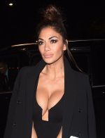 Nicole-Scherzinger-shows-off-her-cleavage-in-Black-Leather-2.jpeg