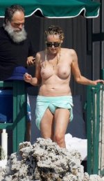 Sharon-Stone-Nude-On-The-Beach-At-63-TheFappening.Pro-9.jpg