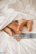 couples-feet-in-bed.jpg