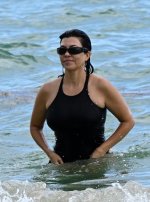 Kourtney Kardashian - Sizzles in Miami! Flaunts Curves  (1).jpg