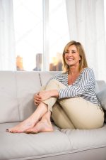 depositphotos_97123090-stock-photo-woman-on-her-sofa.jpg