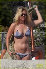alice-eve-poolside-bikini-in-miami-03.webp