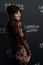 Dakota Johnson - attends the Kering Foundation's Caring for Women dinner in New York City  (13).jpg