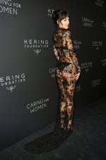 Dakota Johnson - attends the Kering Foundation's Caring for Women dinner in New York City  (20).jpg