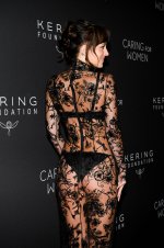 Dakota Johnson - attends the Kering Foundation's Caring for Women dinner in New York City  (21).jpg