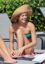 Olivia Dunne - Sits poolside in a bikini in Kauai (1).jpg