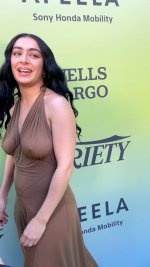 Charli XCX in a sheer dress in a subdued olive green color (7).jpg