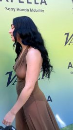 Charli XCX in a sheer dress in a subdued olive green color (6).jpg