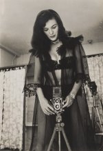 Bunny  Yeager in Black Lace with Her Rolleiflex Camera, 1955.jpg