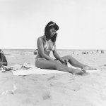 Bettie Page in a human moment by Bunny Yeager.jpg