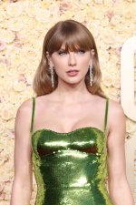 taylor-swift-attends-81st-annual-870439928.jpg