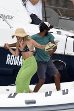 millie-bobby-brown-stuns-in-a-bikini-top-while-she-enjoys-a-boat-ride-with-boyfriend-jake-bong...jpg