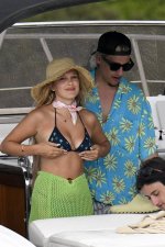 millie-bobby-brown-stuns-in-a-bikini-top-while-she-enjoys-a-boat-ride-with-boyfriend-jake-bong...jpg