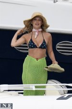 millie-bobby-brown-stuns-in-a-bikini-top-while-she-enjoys-a-boat-ride-with-boyfriend-jake-bong...jpg