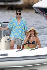 millie-bobby-brown-stuns-in-a-bikini-top-while-she-enjoys-a-boat-ride-with-boyfriend-jake-bong...jpg