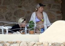 millie-bobby-brown-soaks-up-the-sun-in-a-colorful-bikini-before-grabbing-beachside-lunch-with-...jpg