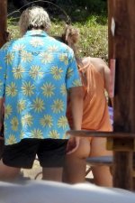 millie-bobby-brown-seen-wearing-an-orange-bikini-while-relaxing-by-the-beach-with-boyfriend-ja...jpg