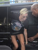 miley_cyrus_upskirt_arriving_at_bbc_radio_1_studios_in_london_14.jpg